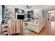 Comfortable living room with built-in shelving and hardwood floors at 120 Middleton Dr, Peachtree City, GA 30269