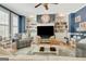 Spacious living room with large windows, fireplace, and hardwood flooring at 120 Middleton Dr, Peachtree City, GA 30269