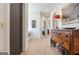 View of hallway with hardwood floors and neutral decor at 135 Kelmscott Ln, Fayetteville, GA 30214