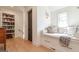 Reading nook with storage under the bench and a wall of bookshelves at 135 Kelmscott Ln, Fayetteville, GA 30214