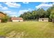 Spacious backyard featuring a detached garage and an additional storage shed at 229 Callaway Rd, Fayetteville, GA 30215