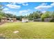 Spacious backyard with a storage shed and wood fencing at 229 Callaway Rd, Fayetteville, GA 30215