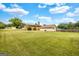 Generous yard with lawn between home and detached garage at 229 Callaway Rd, Fayetteville, GA 30215