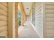 Charming covered porch with brick pillars, offering a welcoming entrance and outdoor space at 229 Callaway Rd, Fayetteville, GA 30215