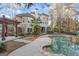 View of the large backyard with inground pool and spa at 612 Champions Dr, Mcdonough, GA 30253