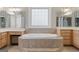 Luxurious bathroom with a large soaking tub and double vanity at 612 Champions Dr, Mcdonough, GA 30253