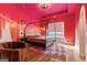 Stylish bedroom featuring a unique wall design, hardwood floors, and canopy bed at 612 Champions Dr, Mcdonough, GA 30253