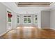 Bright bedroom boasts hardwood floors, neutral walls, and recessed lighting at 612 Champions Dr, Mcdonough, GA 30253