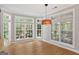 Bright breakfast nook with large windows offering natural light and outdoor views at 612 Champions Dr, Mcdonough, GA 30253