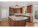 Spacious kitchen featuring granite countertops, stainless appliances, and wood cabinets at 612 Champions Dr, Mcdonough, GA 30253