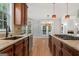 Gourmet kitchen features a large island, granite countertops, and stainless appliances at 612 Champions Dr, Mcdonough, GA 30253