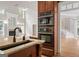 Well-appointed kitchen features an island and modern appliances at 612 Champions Dr, Mcdonough, GA 30253