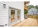 Back porch with doorway to interior dining room and a view to the back porch seating area at 3785 Pilgrim Mill Rd, Cumming, GA 30041