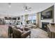 Spacious living room featuring a fireplace, plush seating, and open concept design at 120 Aj Welch Jr Way, Mcdonough, GA 30252