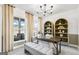 Bright office with stylish built-ins, desk, neutral palette, and abundant natural light at 120 Aj Welch Jr Way, Mcdonough, GA 30252