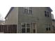 View of the home's exterior showing the side and back of the house at 7522 Springbox Dr, Fairburn, GA 30213