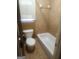 Bathroom featuring a toilet and tub at 245 Ashley Forest Dr, Fayetteville, GA 30214