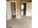 A large bedroom with carpet flooring and two closets at 245 Ashley Forest Dr, Fayetteville, GA 30214