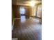 Bedroom featuring hardwood floors, neutral walls, and ample natural light at 245 Ashley Forest Dr, Fayetteville, GA 30214
