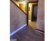 Inviting hallway with neutral walls and trim, leading to rooms filled with natural light at 245 Ashley Forest Dr, Fayetteville, GA 30214