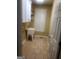 Laundry room with tile floors, utility sink, and cabinets at 245 Ashley Forest Dr, Fayetteville, GA 30214