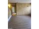 Neutral living room with hardwood floors, neutral walls, and ample natural light at 245 Ashley Forest Dr, Fayetteville, GA 30214