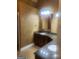 Bathroom featuring dual sinks, a granite countertop, and an ornate framed mirror at 245 Ashley Forest Dr, Fayetteville, GA 30214