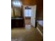Bathroom with a vanity and mirror, tile flooring, and doorway to another room at 245 Ashley Forest Dr, Fayetteville, GA 30214