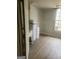Utility room featuring a utility sink, water systems, and ample natural light at 245 Ashley Forest Dr, Fayetteville, GA 30214