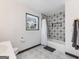 Bathroom featuring patterned tiles, a shower-tub combo, and a modern sink at 3044 Sunset Ln, East Point, GA 30344