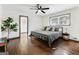 Bedroom with hardwood floors, a ceiling fan, and natural light at 3044 Sunset Ln, East Point, GA 30344