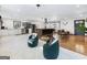 Open-concept kitchen and living area with stainless steel appliances and modern design at 3044 Sunset Ln, East Point, GA 30344