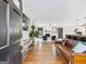Spacious living room features hardwood floors, fireplace, and open access to kitchen at 3044 Sunset Ln, East Point, GA 30344