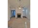 Inviting living room with a stone fireplace, neutral carpet, and a ceiling fan at 181 Linton Dr, Acworth, GA 30102