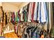 Walk-in closet featuring ample storage and organization, with a variety of hanging clothes at 429 Stagecoach Bnd, Smyrna, GA 30080