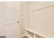 Hall tree in mudroom provides storage and bench seating with hooks at 429 Stagecoach Bnd, Smyrna, GA 30080