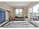 Charming playroom with playful rug, ' toys, a chalkboard, and sliding glass doors to the deck at 429 Stagecoach Bnd, Smyrna, GA 30080