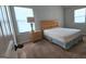 A cozy bedroom features a full-size bed and neutral walls, ready for personalization at 207 Birchwood Dr, Loganville, GA 30052