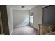 Bedroom with neutral carpet, window with blinds and a chest of drawers at 207 Birchwood Dr, Loganville, GA 30052