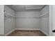 Walk-in closet with wire shelving and carpeted floors at 207 Birchwood Dr, Loganville, GA 30052
