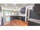 Spacious kitchen featuring granite countertops, stainless steel appliances, and ample cabinet space at 207 Birchwood Dr, Loganville, GA 30052