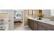 The bathroom features a double vanity with granite countertops and a view into the connected bedroom at 745 Myrica Ave, Locust Grove, GA 30248