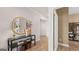 Entryway with a decorative mirror above a console table; warm and inviting entrance for the home at 745 Myrica Ave, Locust Grove, GA 30248
