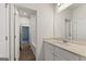 Neutral bathroom featuring a sink, countertop, and view to bathroom with tub at 275 Arwen Dr # 68, Mcdonough, GA 30252
