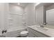 Bathroom featuring single sink vanity with a shower and tub combination at 275 Arwen Dr # 68, Mcdonough, GA 30252