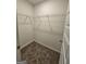 Walk-in closet includes wire shelving for maximum storage and organization at 1925 Labonte Pkwy, Mcdonough, GA 30253