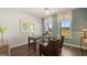 Well-lit office space with large windows and neutral decor offers a calming workspace at 741 Myrica Ave, Locust Grove, GA 30248