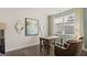Bright home office space with desk, comfortable seating, natural light, and stylish decor at 741 Myrica Ave, Locust Grove, GA 30248