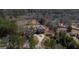 Bird's-eye view of the brick home highlighting the pool, basketball court and circular drive at 1408 Hemphill Rd, Stockbridge, GA 30281