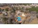 Aerial view of the neighborhood showing the pool and outdoor basketball court amenities of the home at 1408 Hemphill Rd, Stockbridge, GA 30281